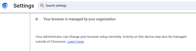 The "Your browser is managed by your organization" message.